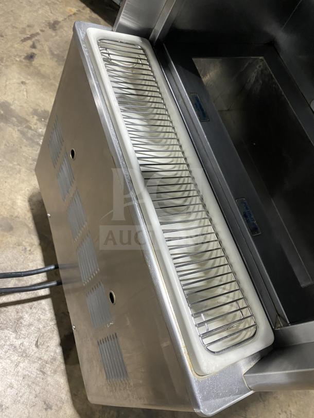 Taylor 342D-27 commercial stainless steel frozen drink machine, dual flavor, on casters, in good condition. Model 342D-27.