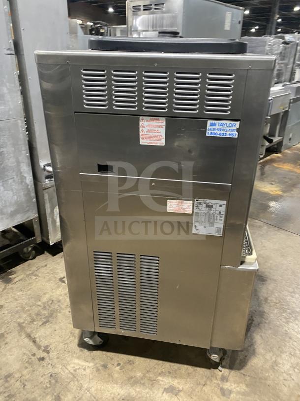 Taylor 342D27 stainless steel frozen drink machine, double flavor, on casters, 208-230V, pristine condition, commercial use.