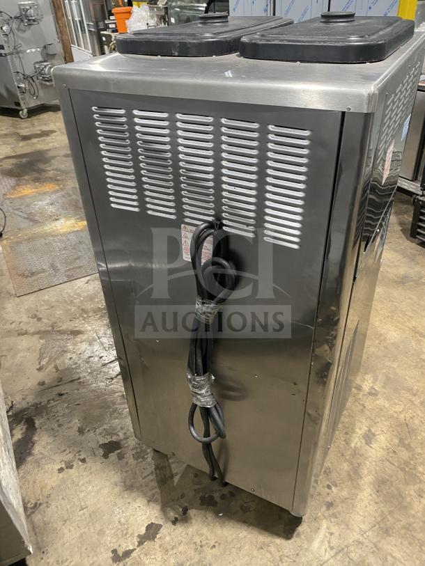 Taylor 342D-27 stainless steel frozen drink machine, dual flavor, floor standing, on casters. Model 342D27 SN: K6018647.