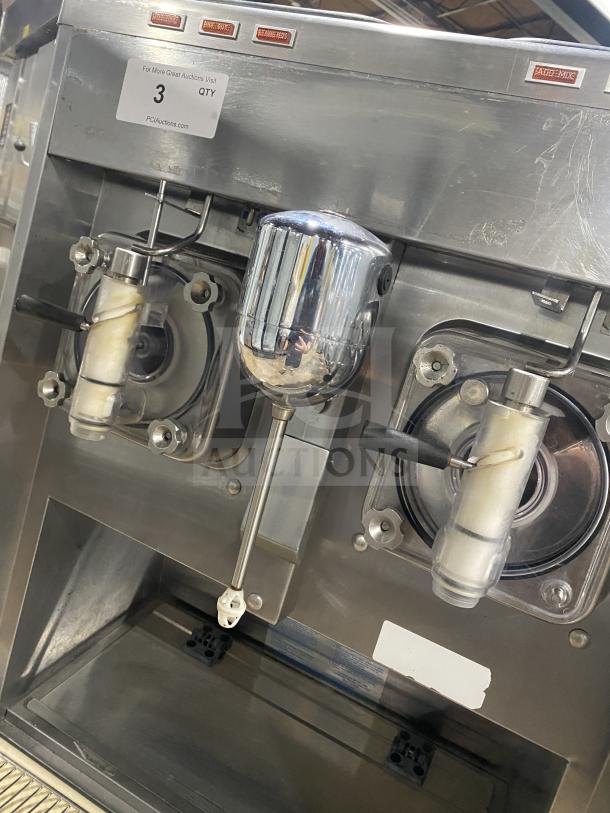 Taylor commercial stainless steel double flavor frozen drink machine, model 342D-27, on casters, excellent condition.