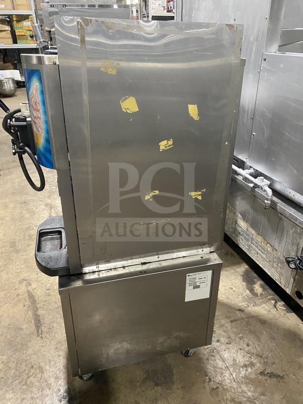 Taylor Crown C70733 Stainless Steel Single Flavor Soft Serve Machine on casters, electric-powered, minor surface wear.