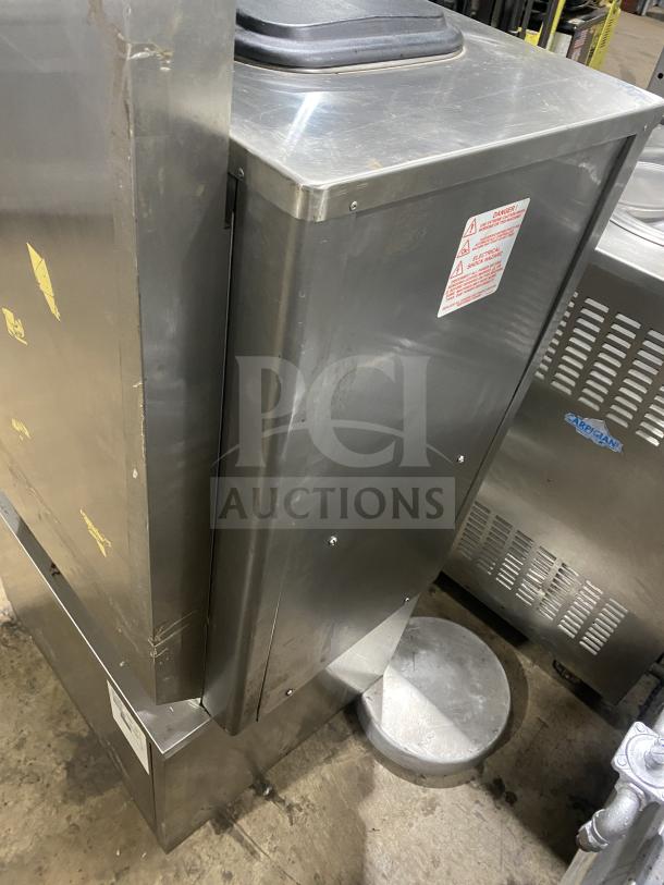 Taylor Crown C70733 stainless steel countertop soft serve machine, single flavor, electric, 208-230V 3 phase, on casters.
