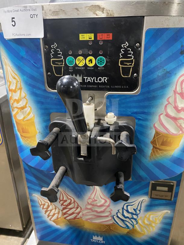Taylor Crown C70733 stainless steel soft serve machine, single flavor, electric, countertop model, on casters, controls visible.
