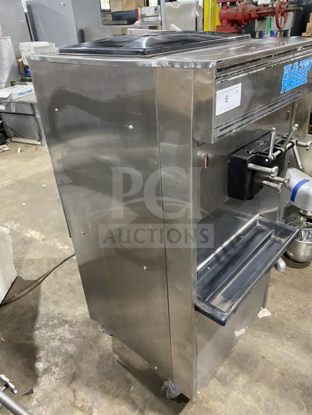 Electro Freeze stainless steel soft serve machine, twin/twist, 2 hoppers, 3 dispensers, on casters, used condition.
