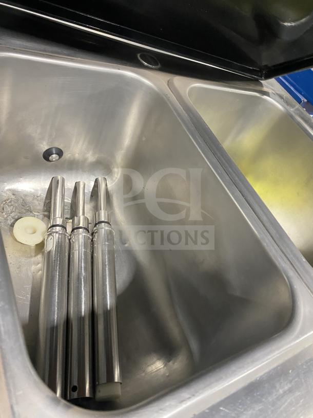 Electro Freeze stainless steel soft serve machine components, showing interior compartments and dispensers. Good condition.