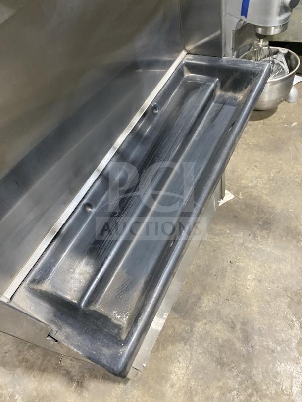 Electro Freeze stainless steel twin/twist soft serve machine, 2 hoppers, 3 dispensers, on casters, good condition.