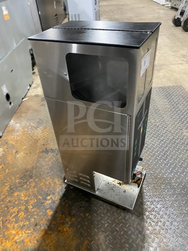 Curtis ILGD-10 stainless steel countertop coffee grinder, twin 7.5 lb capacity, model SN: 12279765, used condition.