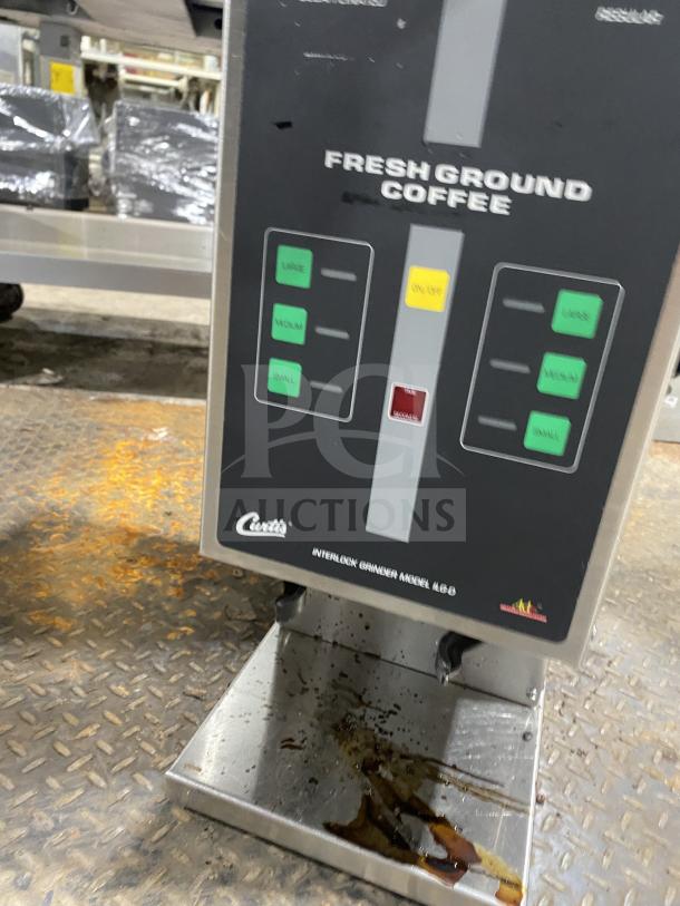 Curtis ILGD10 Commercial Stainless Steel Coffee Grinder, 7.5 lb capacity, model ILGD-10, seen with control panel and drip tray, 120V.