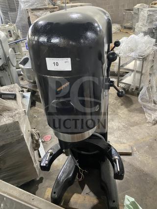 Hobart commercial black floor model planetary mixer in good condition, featuring control levers; label with auction details visible.