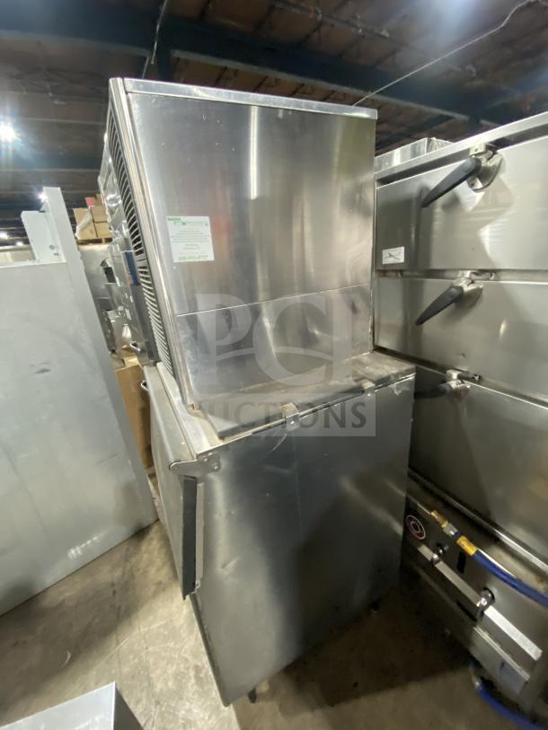 Hoshizaki KM515MAH stainless steel ice machine, crescent-cube style, electric, air-cooled, on legs, commercial use.