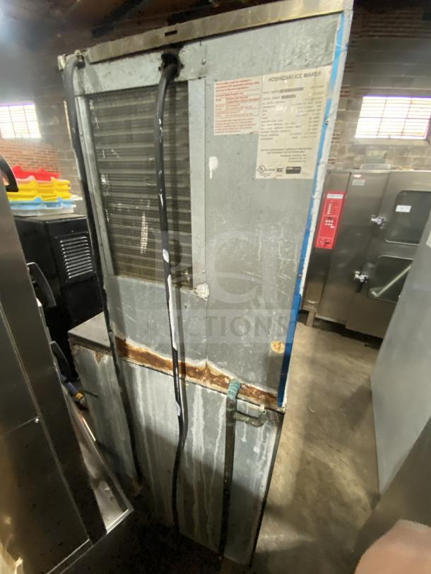 Hoshizaki KM-515MAH ice maker head/bin combo, stainless steel, air-cooled, 115-120V, on legs, visible wear.