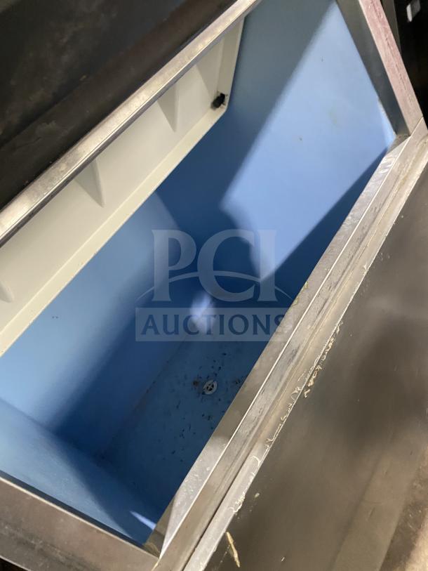 Hoshizaki KM-515MAH ice maker, crescent-cube style, stainless steel, electric, air-cooled, on legs, good condition.