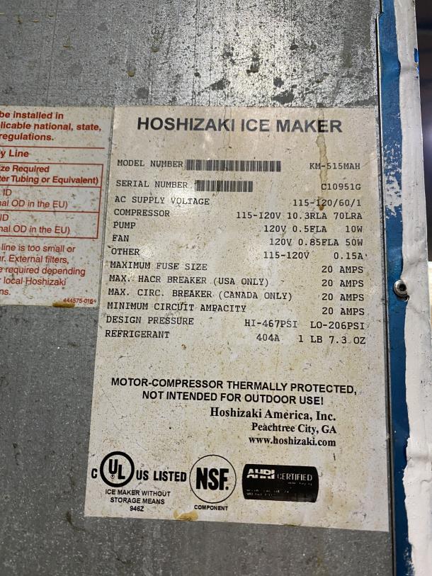 Hoshizaki KM-515MAH ice maker, commercial stainless steel, 115-120V, air-cooled, crescent-cube style, on legs.