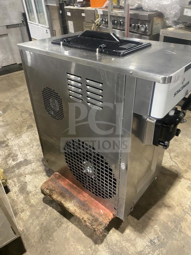 Spaceman 6236C stainless steel soft serve ice cream machine. Electric-powered countertop model, 220V, 1 phase. Commercial use.