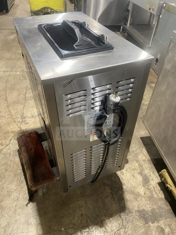Spaceman Model 6236C stainless steel soft serve ice cream machine, 220V, 1 Phase. Commercial countertop design, good condition.
