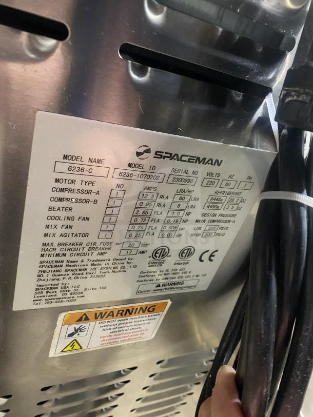 Spaceman 6236-C stainless steel soft serve ice cream machine, 220V, 1 Phase, SN 2300996, with detailed specification label.