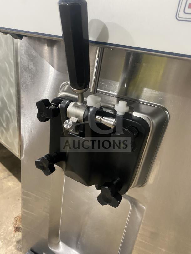 Spaceman commercial stainless steel soft serve machine, Model 6236C, features lever controls, 220V, 1 phase, close-up view.