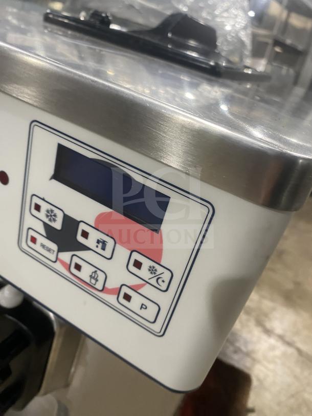 Spaceman 6236C stainless steel countertop soft serve machine control panel, features easy operation buttons, 220V, 1 phase.