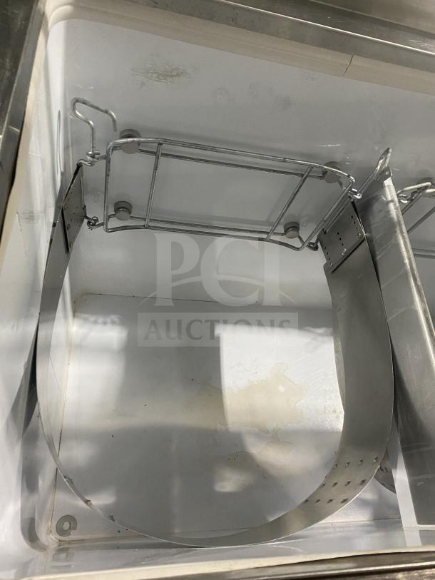 Beverage-Air 68" white ice cream dipping cabinet with sneeze guard, rear lift doors, interior view showing clean condition.