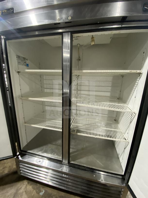 True T-49 Stainless Steel 2-Door Reach-In Refrigerator on casters, Energy Star certified, with poly coated wired racks.