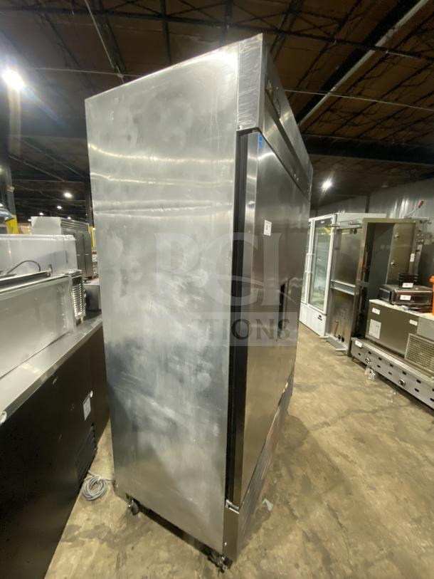 True T-49 stainless steel commercial refrigerator, two solid doors, Energy Star, on casters, Model T-49, SN: 7387981.