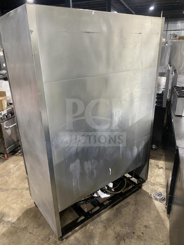 True T-49 stainless steel 2-door reach-in refrigerator, Energy Star certified, poly-coated wire rack, on casters, 115V, 1 phase.