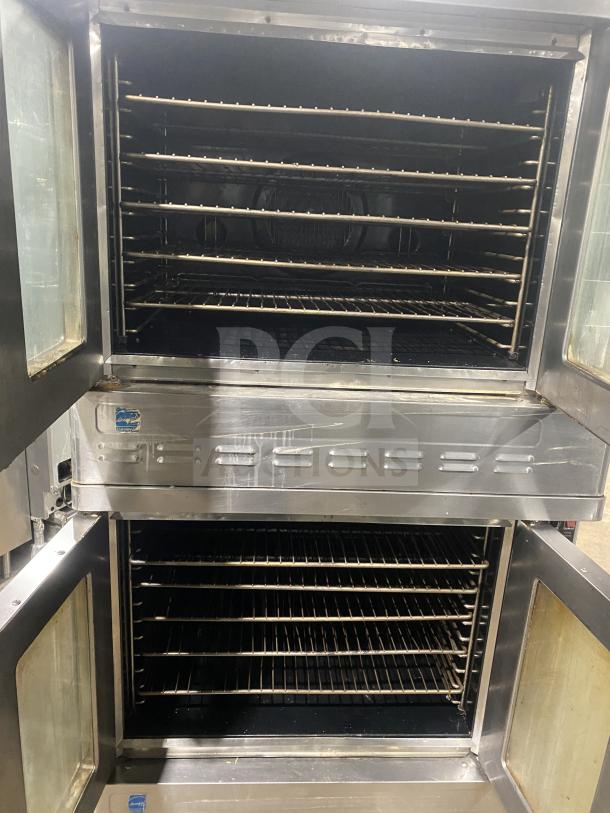 Blodgett commercial stainless steel double-stacked gas convection oven with wired racks, Energy Star certified, on legs.