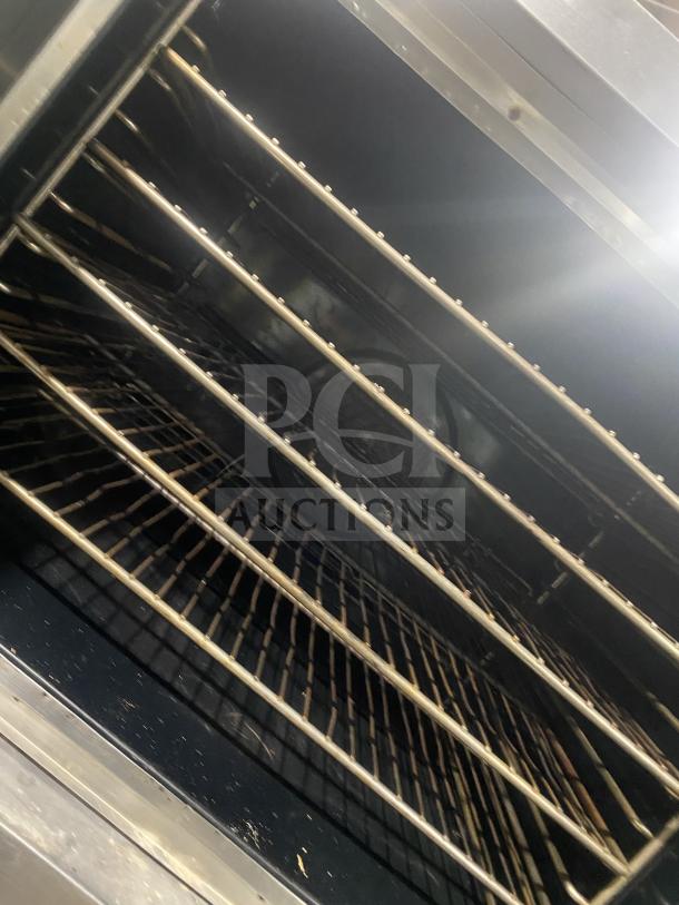 Blodgett stainless steel gas double convection oven, Energy Star certified, includes wired oven rack, on legs.