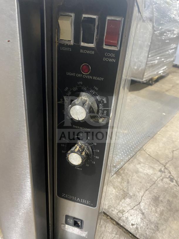 Blodgett Zephaire stainless steel gas convection oven control panel, showing switches for lights, blower, cool down, and thermostat.