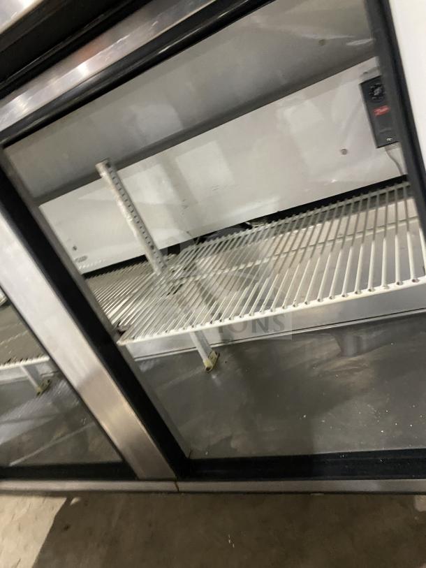 True TUC-72 3-Door Stainless Steel Undercounter Refrigerator, poly-coated wire rack, 115V 1 Phase, on casters, SN: 6718114.