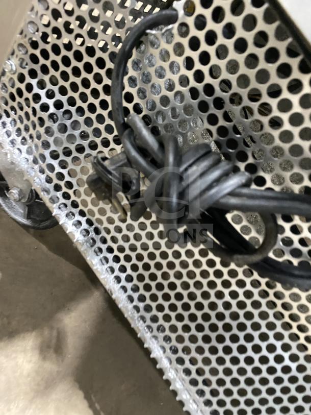 Alt text: True TUC-72 stainless steel undercounter fridge with poly-coated wire rack. Model TUC72, SN 6718114, 115V 1 phase.