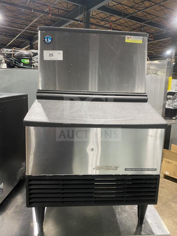 Hoshizaki KM231BAJ stainless steel undercounter ice maker, 115V, 80 lb storage, hinged top access, air-cooled, on legs.