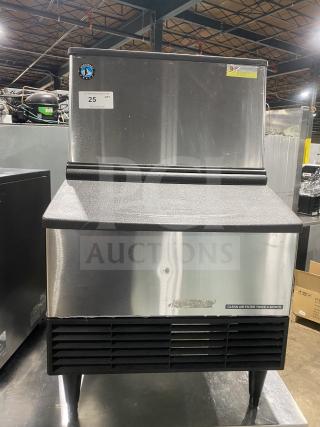 Hoshizaki KM231BAJ stainless steel undercounter ice maker, 115V, 80 lb storage, hinged top access, air-cooled, on legs.