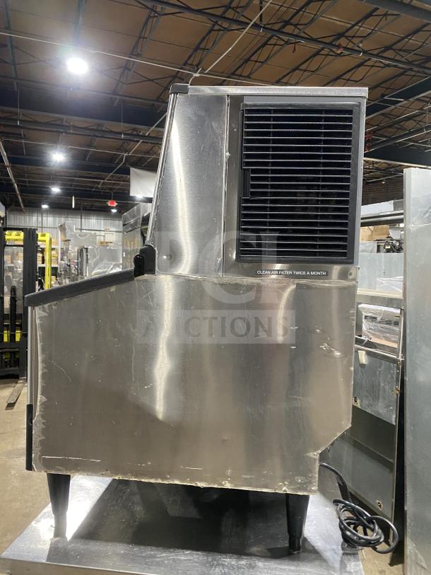 Hoshizaki KM-231BAJ undercounter ice machine, stainless steel, air-cooled, on legs, includes 80 lb. storage bin, model SN: J00322J.