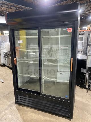 True commercial double glass door refrigerator, model GDM-45EM, Energy Star, poly coated racks, black finish, excellent condition.