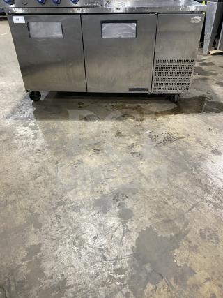 True TWT-67 stainless steel 2-door worktop cooler on casters, features poly-coated wired rack, serial 1-3856080, 115V, 1 phase.