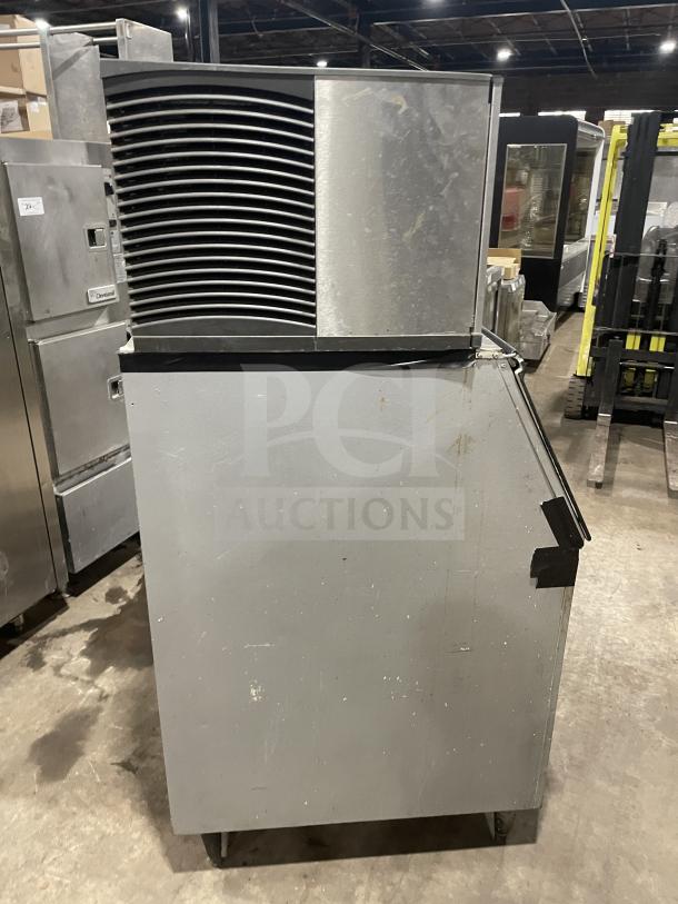 SY0304A Commercial stainless steel ice maker, model SY0304A, on legs. Air-cooled, electric-powered, and used condition.
