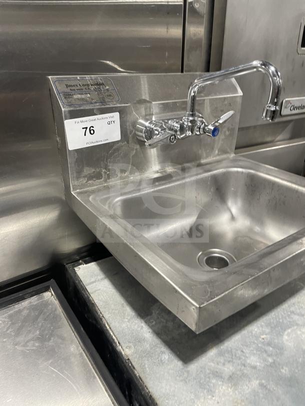 Jimex SSH-14 stainless steel wall-mount hand sink with back splash, commercial-grade, slight wear visible, auction tag attached.