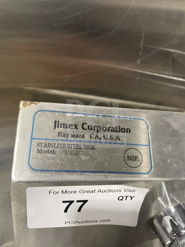 Jimex Corporation stainless steel wall-mount hand sink with NSF label, back splash. Some wear visible. Auction tag 77.