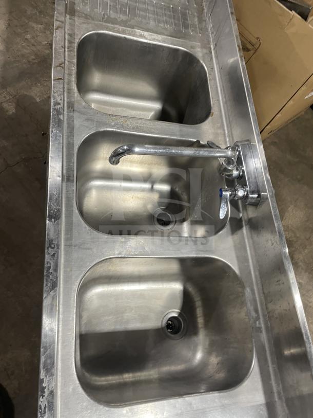 Jimex commercial stainless steel heavy-duty 3-compartment bar sink on legs; fair condition, integral faucet, visible wear.