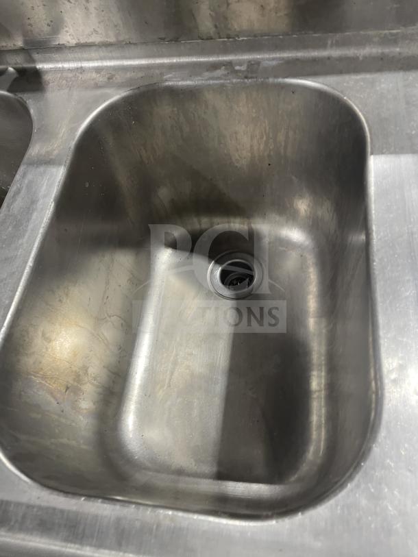 Jimex commercial stainless steel heavy-duty 3-compartment bar sink on legs, in used condition.