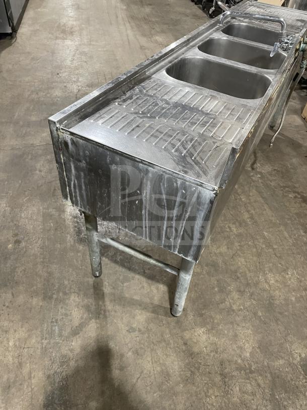 Jimex commercial stainless steel 3-compartment bar sink with legs, industrial-grade, some surface wear, ideal for high-usage environments.