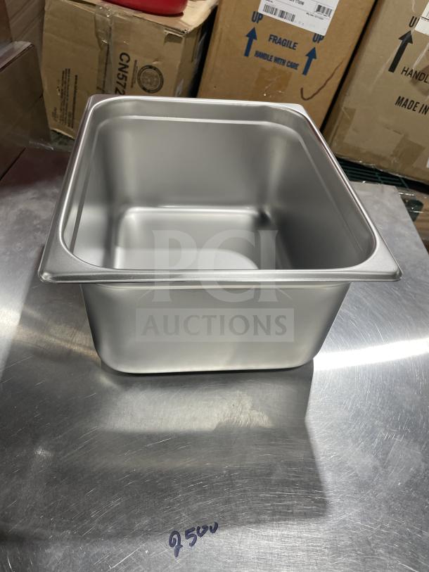 Winco SPJL-206 stainless steel half-size 6" deep anti-jam steamtable pan, new condition, shown on reflective surface.