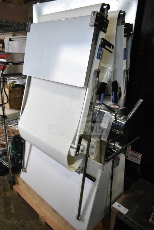 Brand new Estella DSF94 94" reversible dough sheeter, model 348DSF94, 110V, 1 phase, minor scratches, excellent condition.