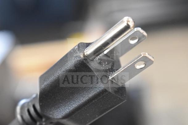 Close-up of 2023 Bizerba GSP HD meat slicer's power plug. 120 Volts, 1 Phase, commercial-grade appliance.