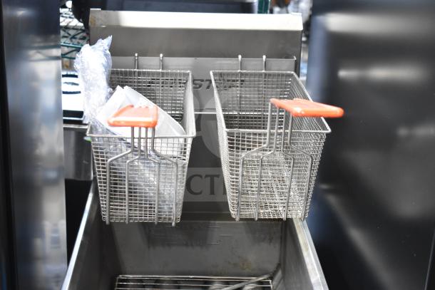 2022 Sierra FRYSTAR500 commercial fryer, natural gas, 30,000 BTU, includes baskets with orange handles, scratch and dent condition.