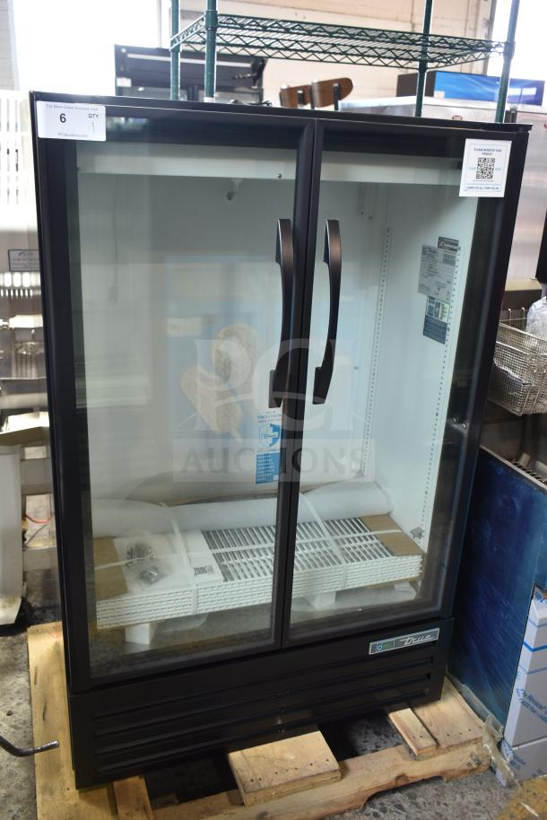 Alt text: True TVM-36SL-HC Reach In Cooler Merchandiser, 2024 model, scratch and dent, new condition, dual glass doors.