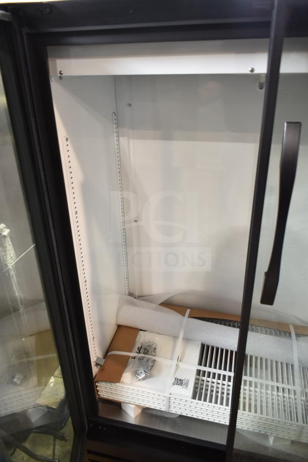 Brand new 2024 True TVM-36SL-HC commercial reach-in cooler, 2 glass doors, 115 volts, 1 phase, with shelves and hardware.