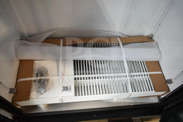 Brand new 2024 True TVM-36SL-HC commercial cooler, 2-door reach-in. Includes shelves, wrapped and secured, 115V, 1 phase.