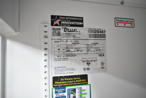 2020 True GDM-49F-HC Commercial Freezer label showing model, voltage, compressor, and refrigerant details.